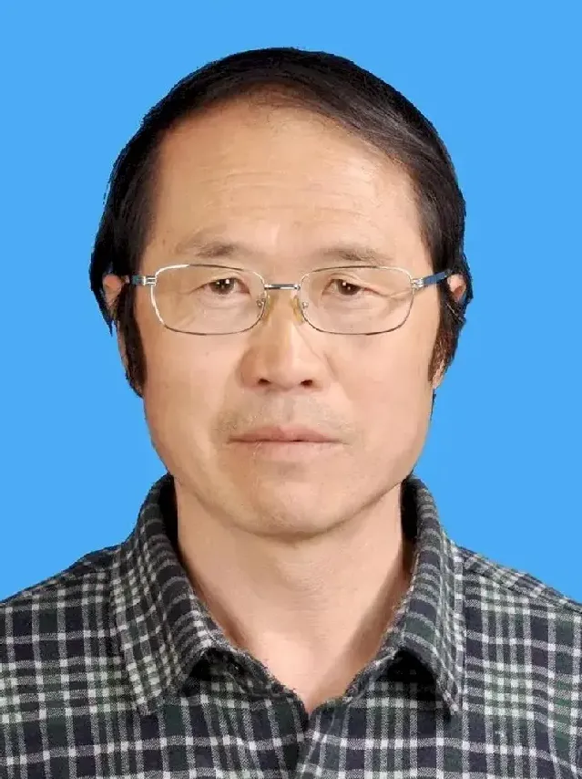 张成德