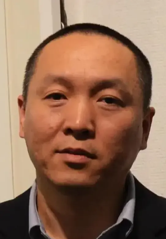 薛明