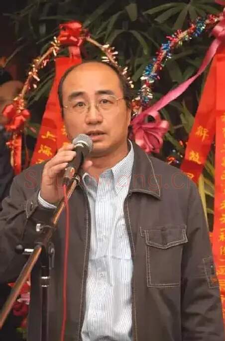 张德明