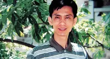 何家英