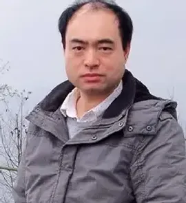滕春任