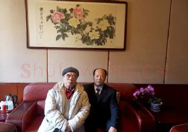 阮成森·与着名画家戴泽合影