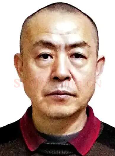 王国强