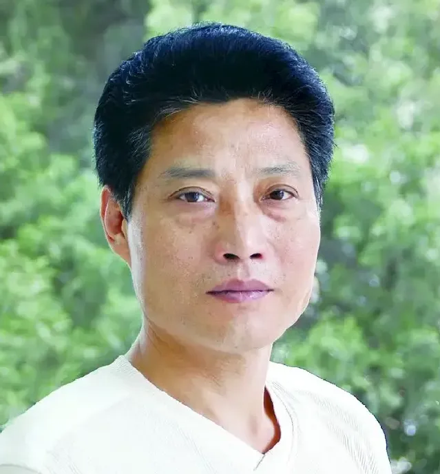 丁万里