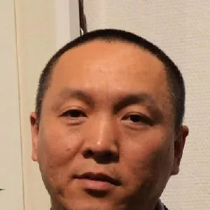 薛明