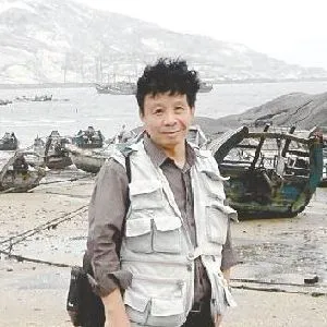 薛国平