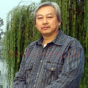 梁日章