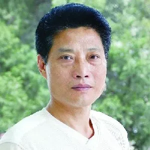 丁万里