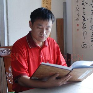 李华