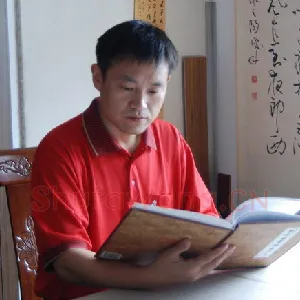 李华